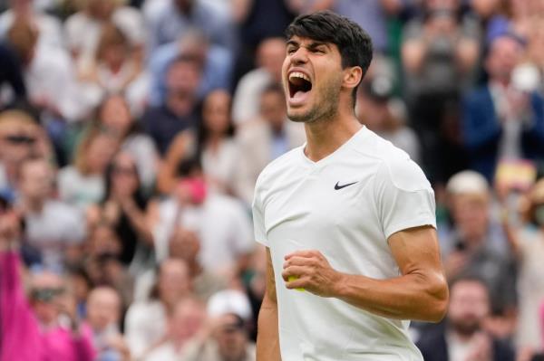 Carlos Alcaraz of Spain reacts during his fourth round match against Ugo Humbert of France at the Wimbledon tennis championships